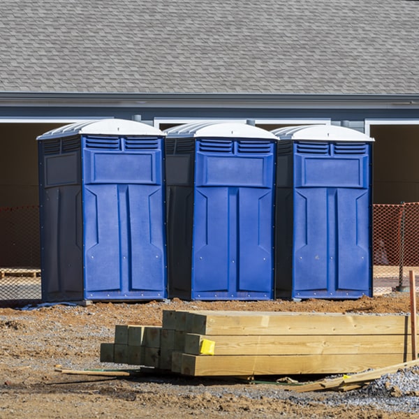what is the cost difference between standard and deluxe porta potty rentals in Spring Arbor Michigan